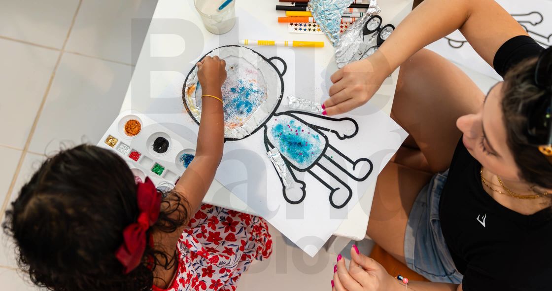 A Group Of People Painting