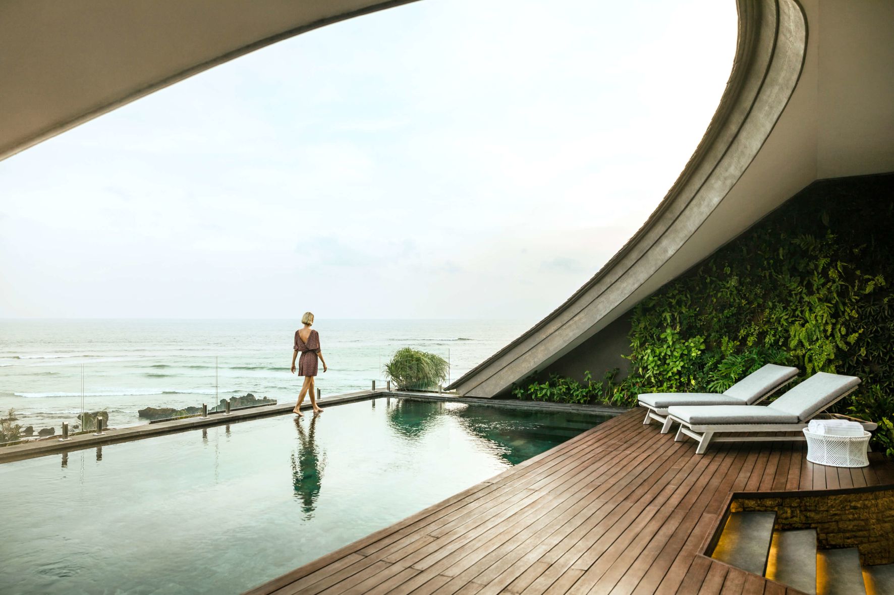 A Person Walking On A Dock