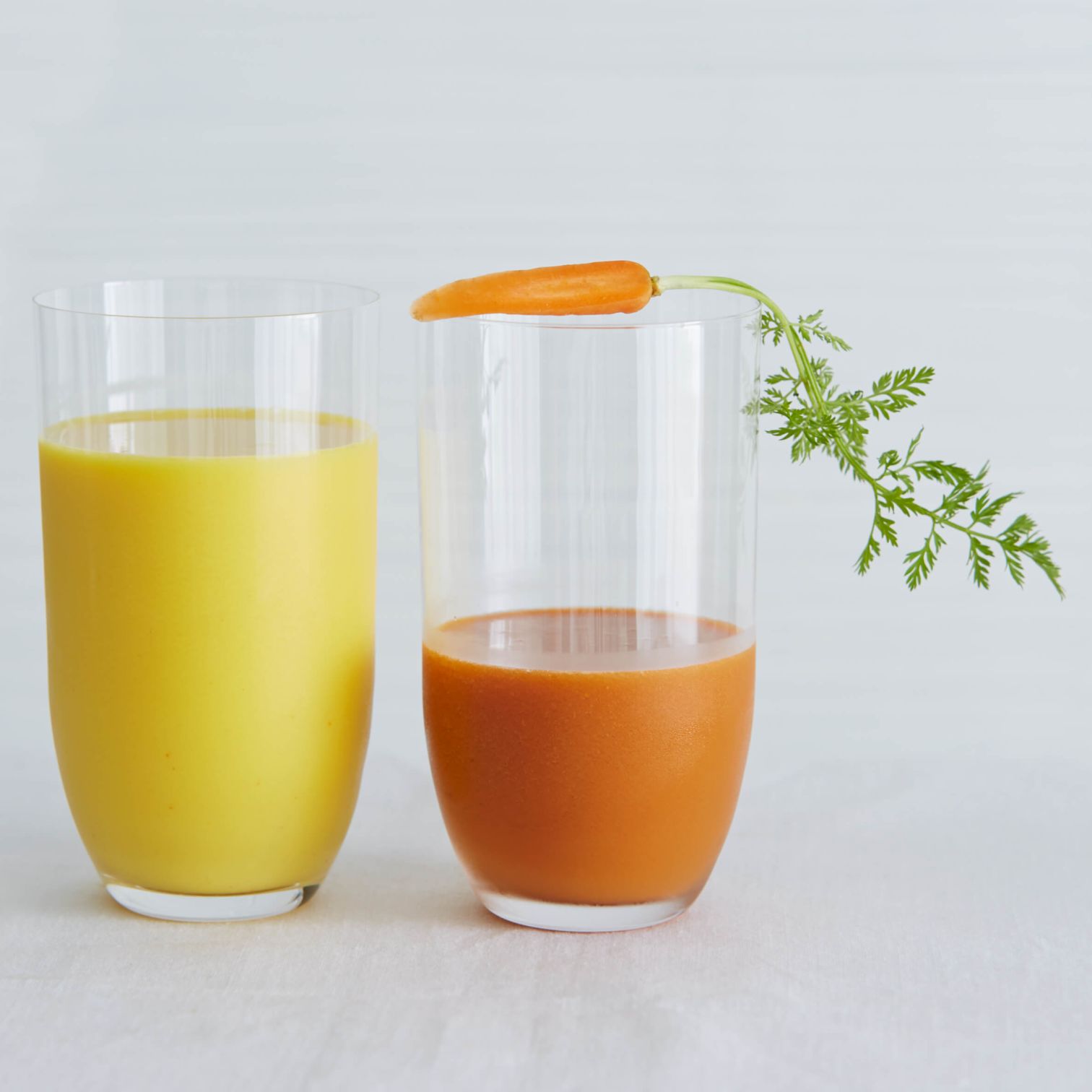 A Group Of Glasses With Liquid In Them