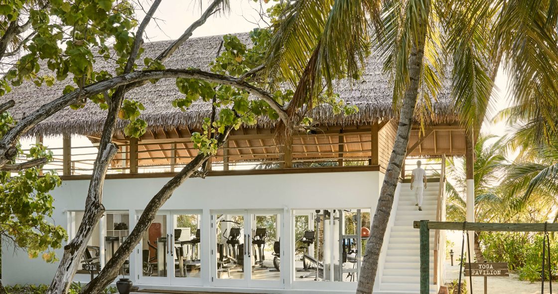 A Building With Trees Around It