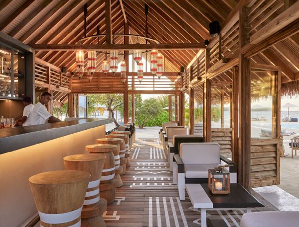 A Person Sitting At A Bar