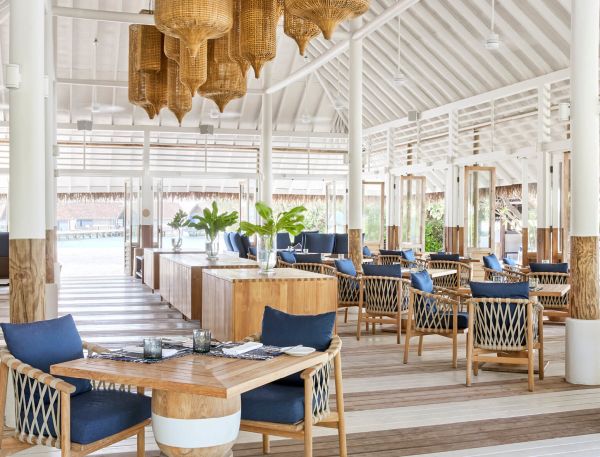 A Room With Tables And Chairs