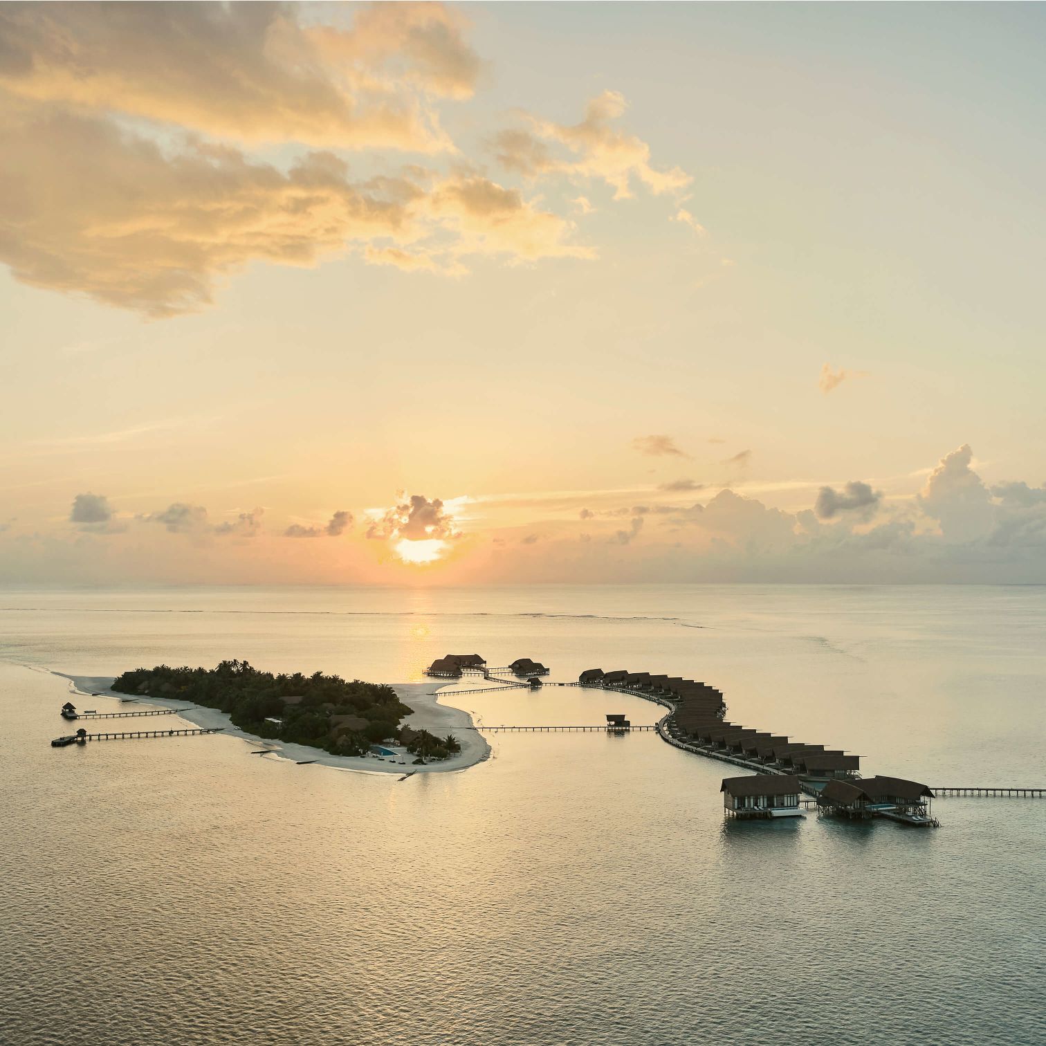 A Beach With Islands And Boats