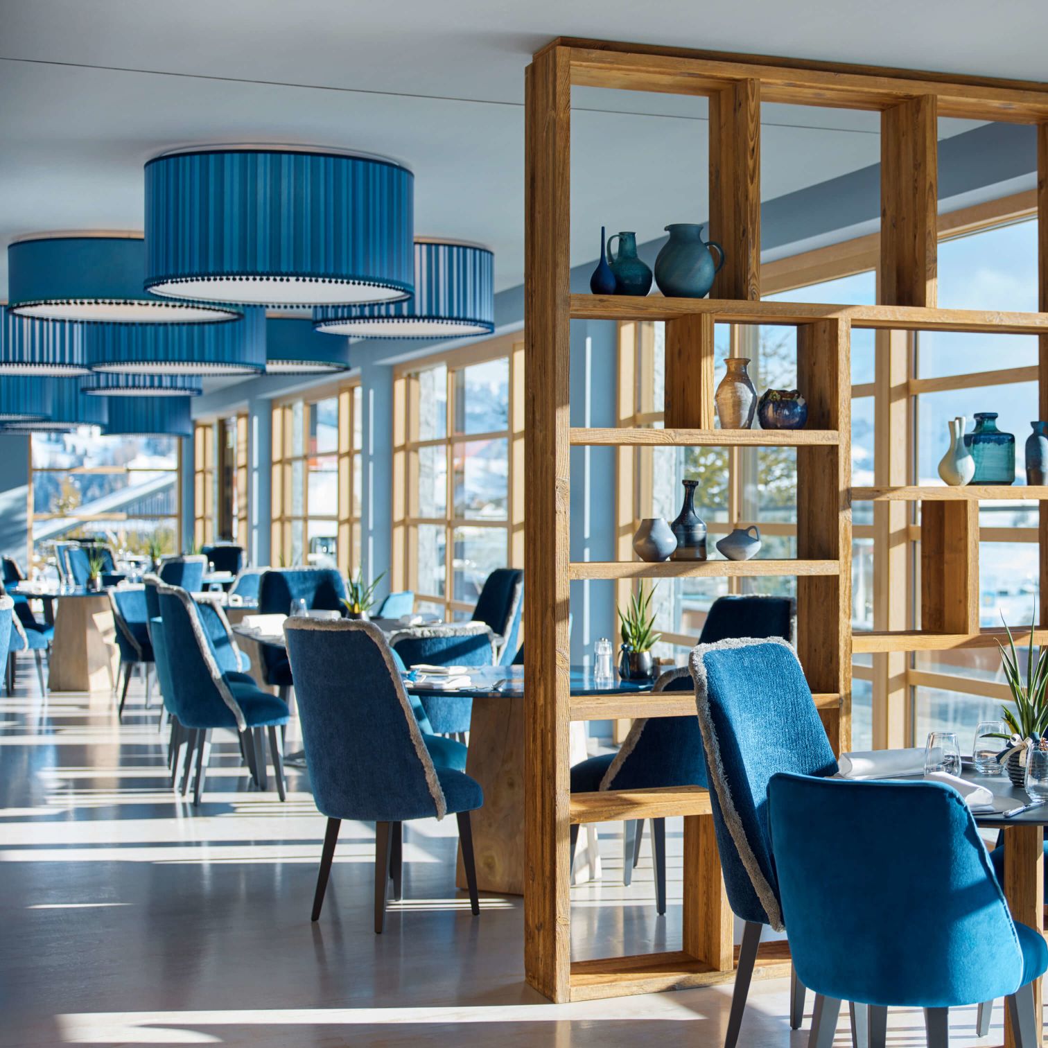 A Room With Shelves And Chairs