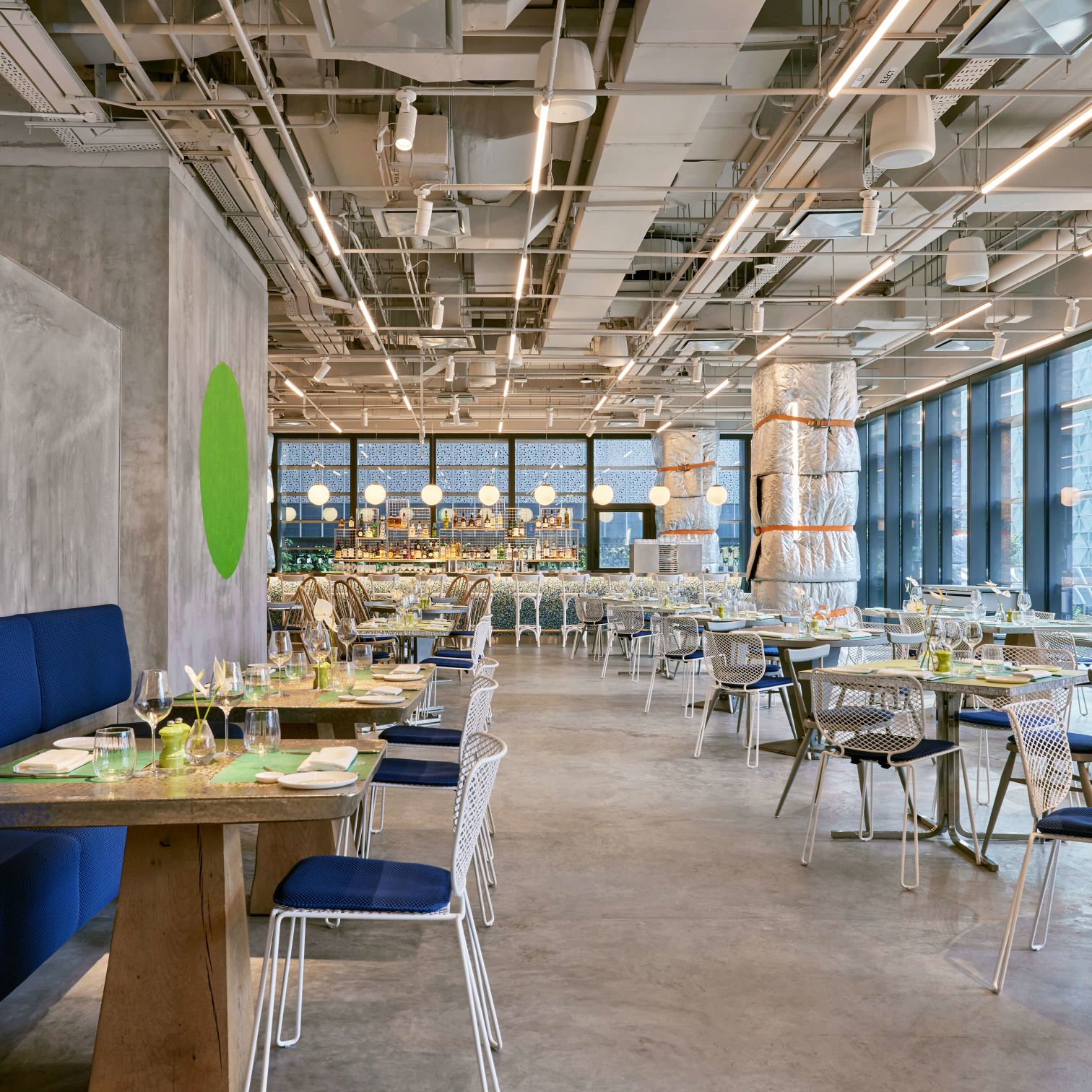 A Room With Tables And Chairs