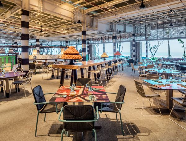 A Room With Tables And Chairs