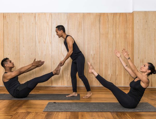 A Group Of People Exercising