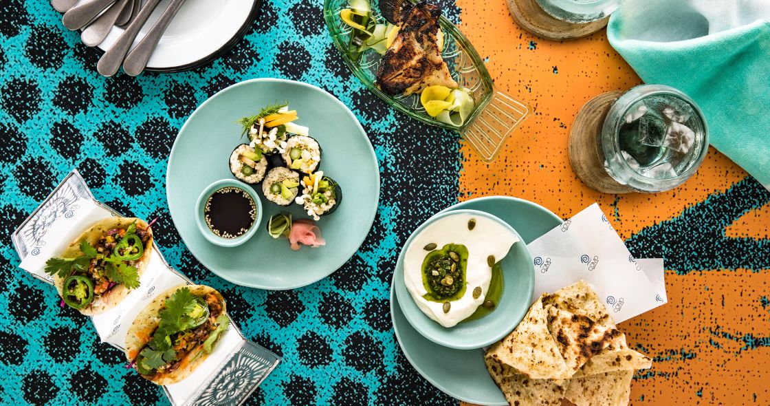 A Table With Plates Of Food