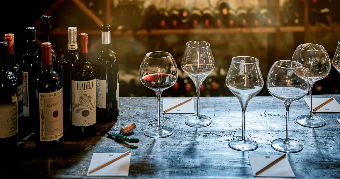 Wine Bottles And Glasses On A Table