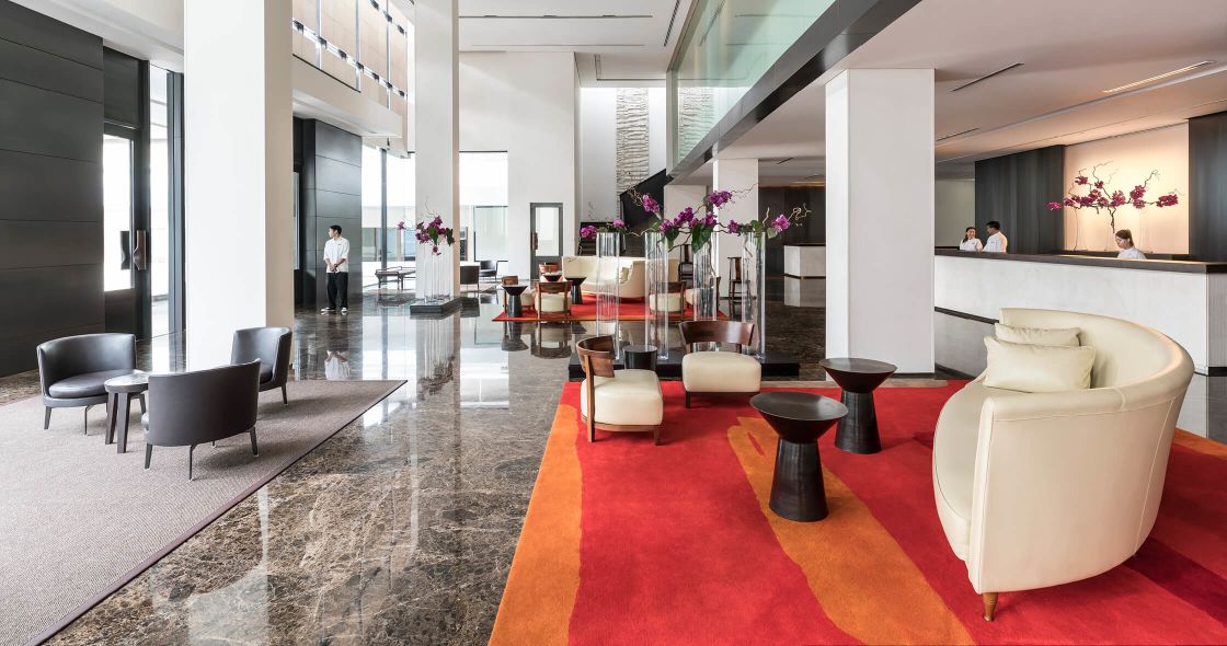 A Room With Chairs And Tables