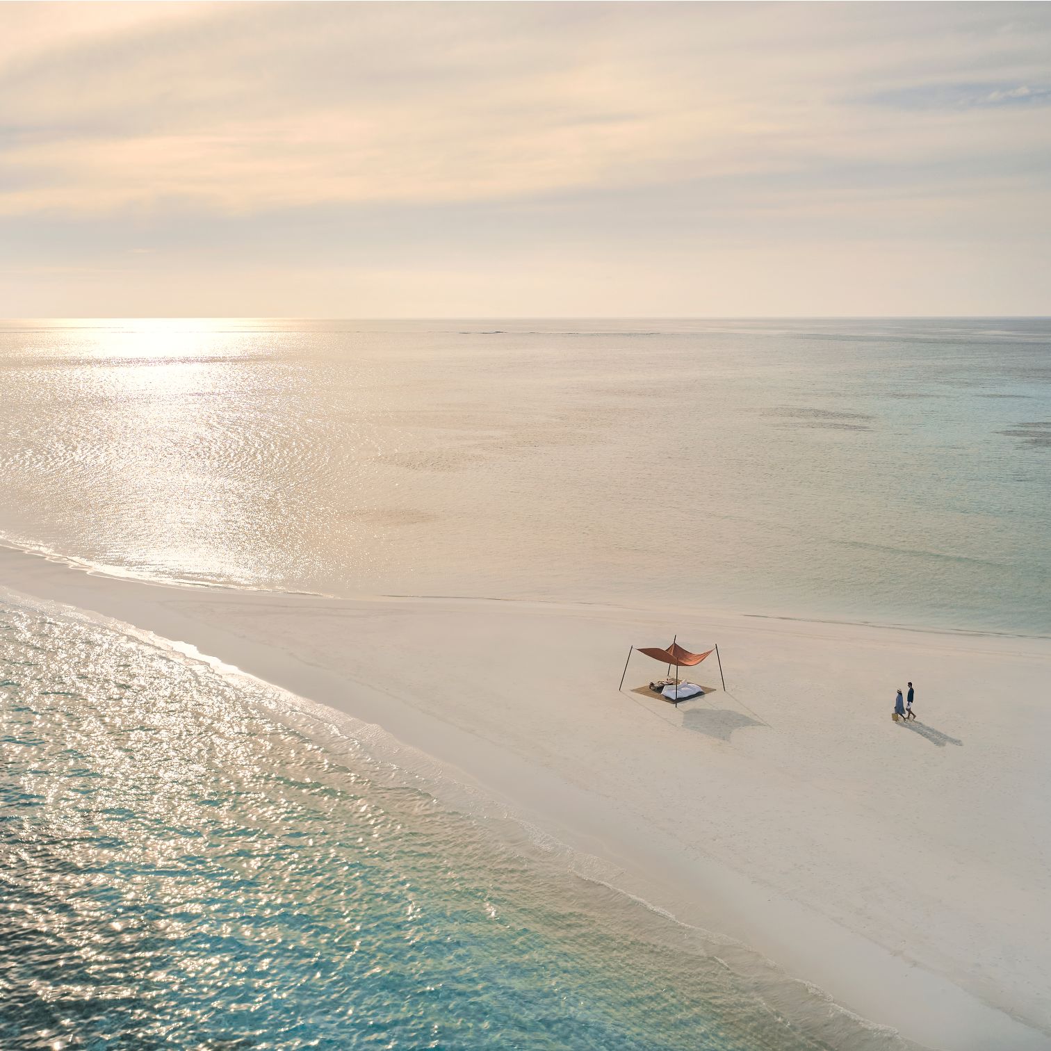 A Beach With A Body Of Water