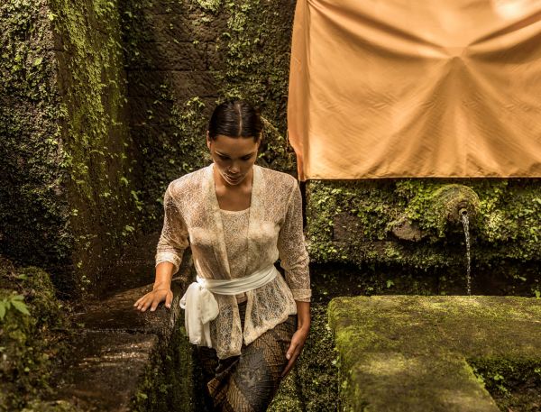 A Man Standing In A Garden