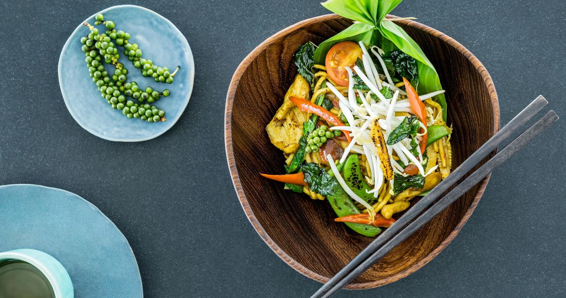 A Bowl Of Soup With Vegetables