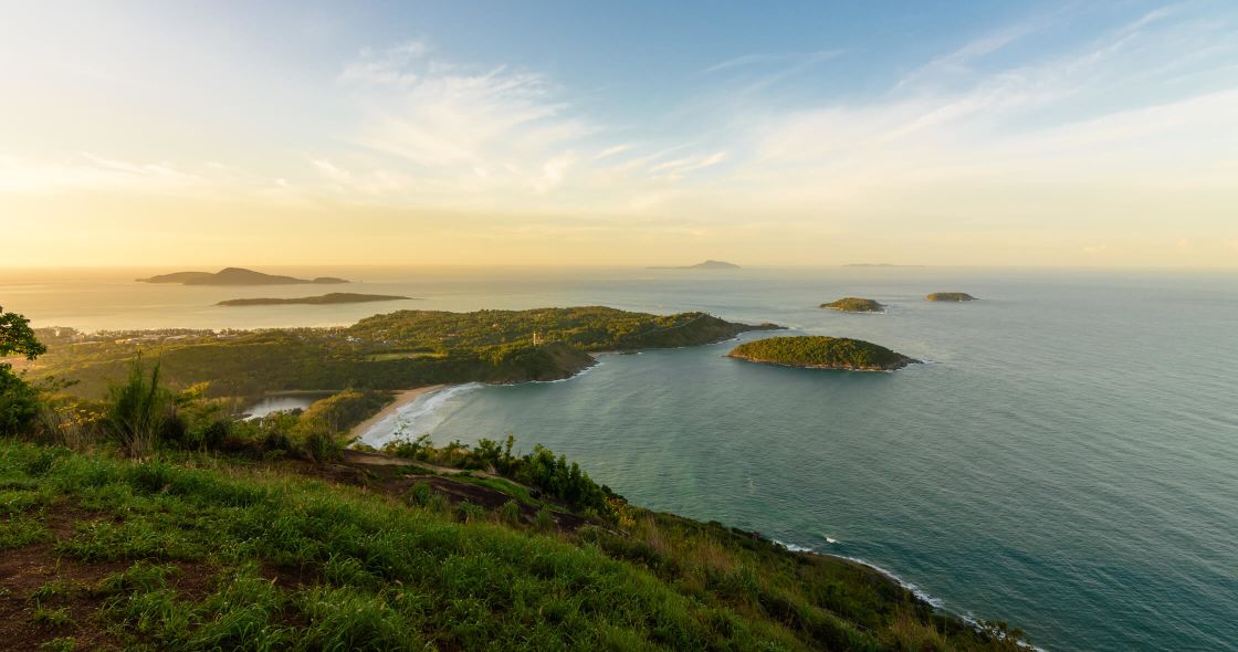 A Body Of Water With Land Around It