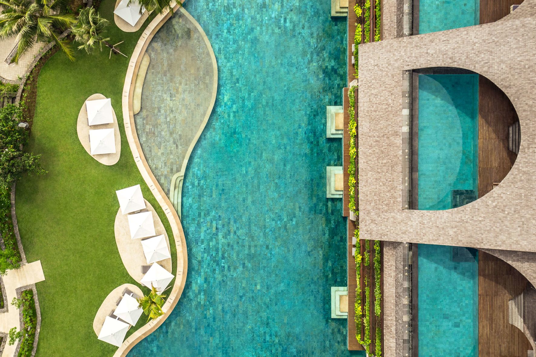 A Building With A Green Lawn