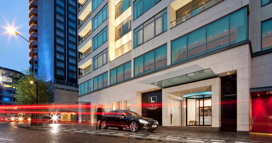 A Car Parked Outside A Building