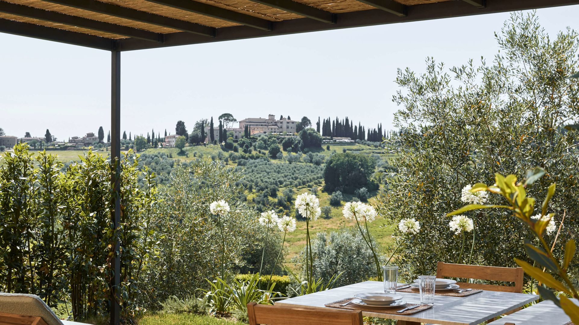 A Table And Chairs On A Deck