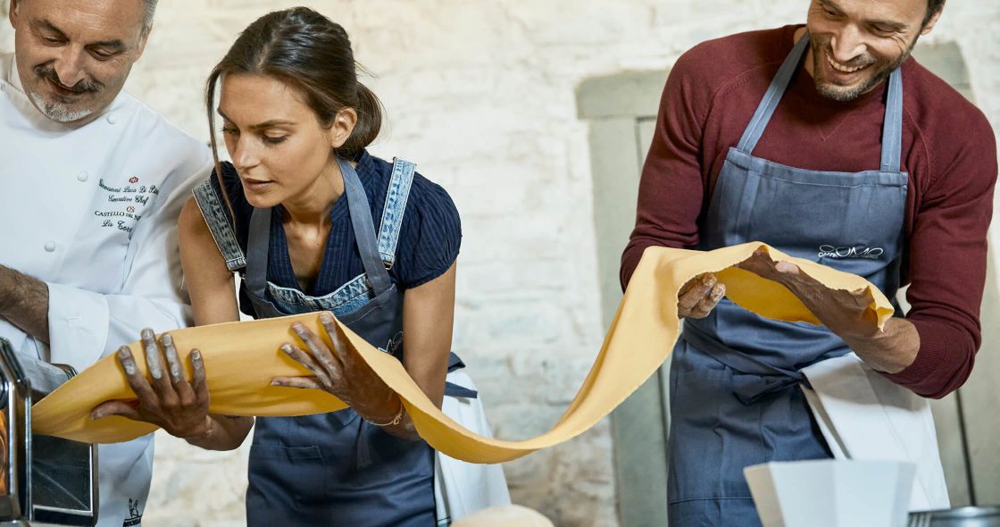 A Person Holding A Hot Dog