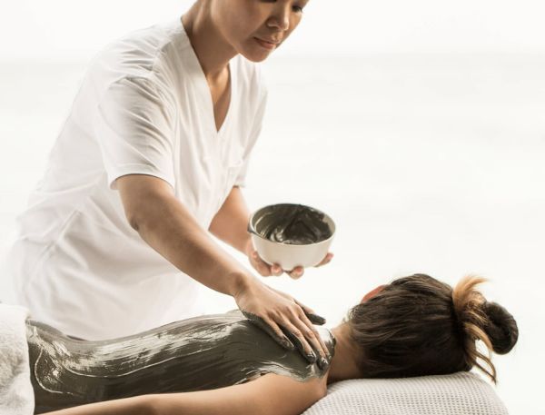 A Woman Holding A Plate