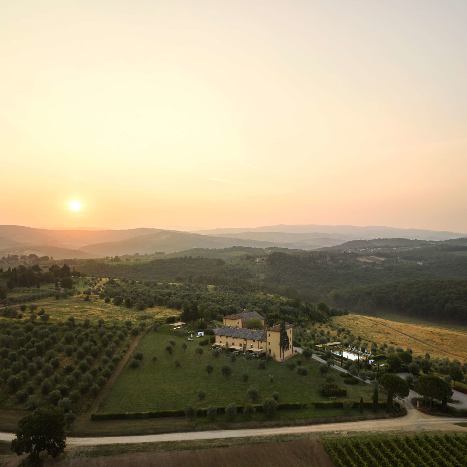 A Landscape With Trees And Buildings