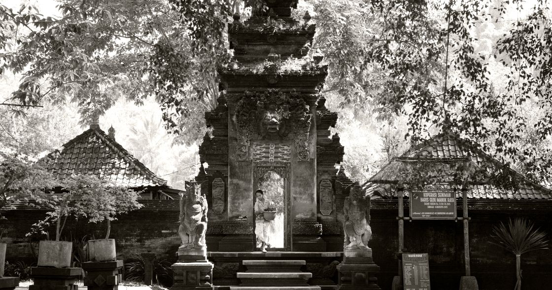 A Building With A Statue In Front Of It