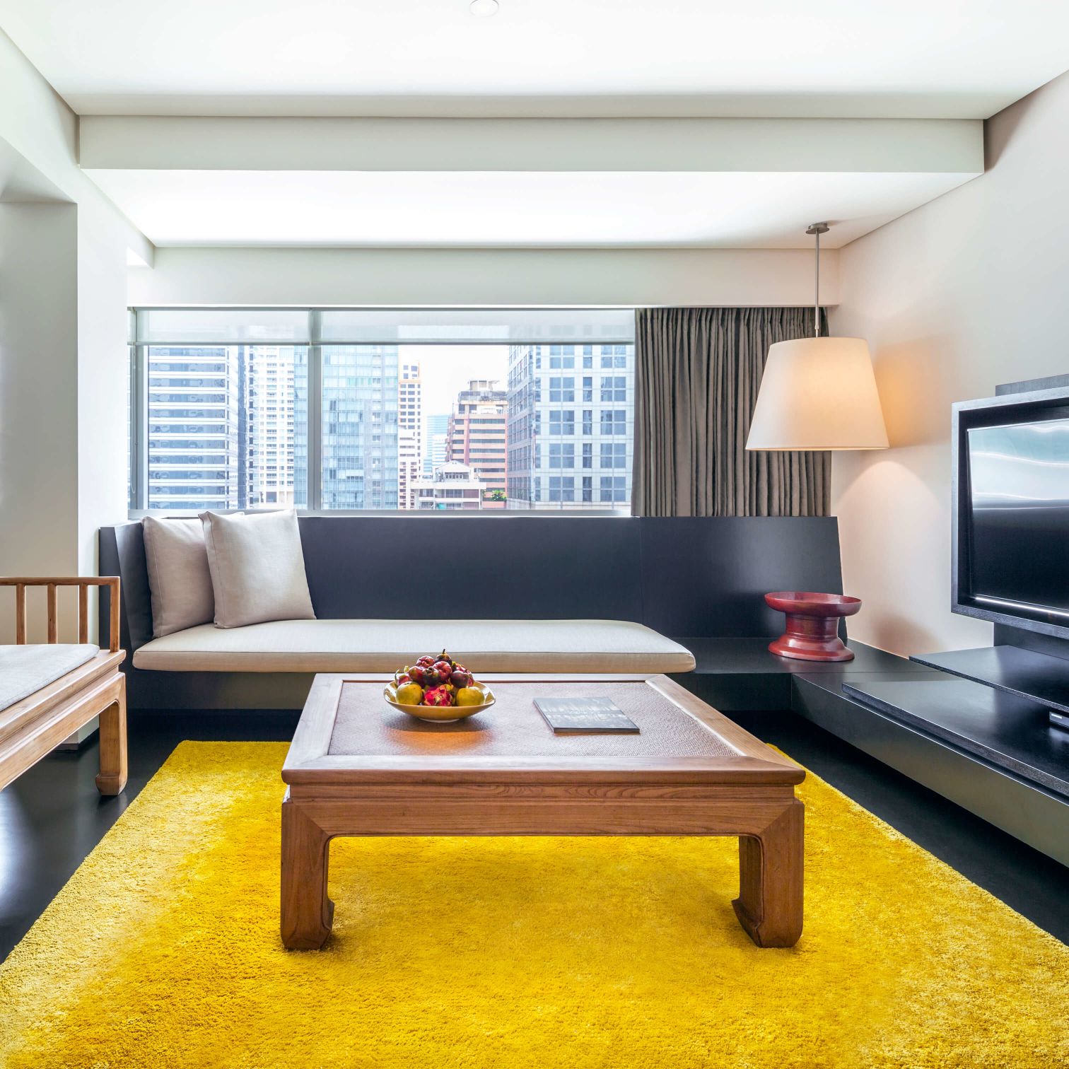 A Living Room With A Couch And A Coffee Table