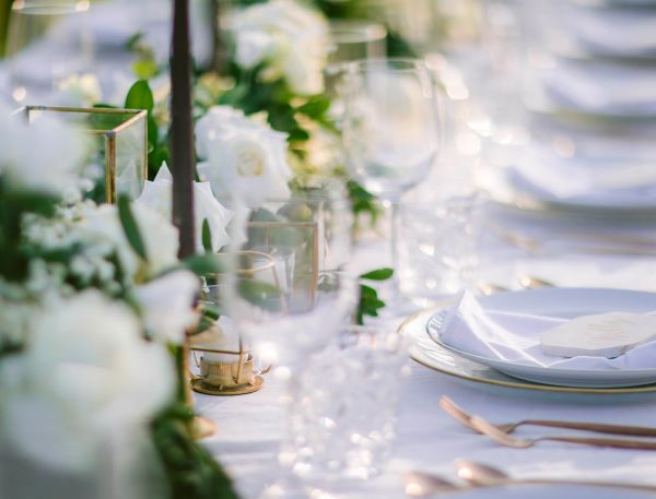 A Table With Plates And Glasses