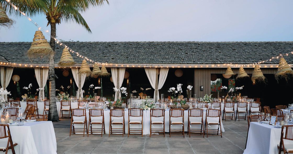 A Patio With Tables And Chairs