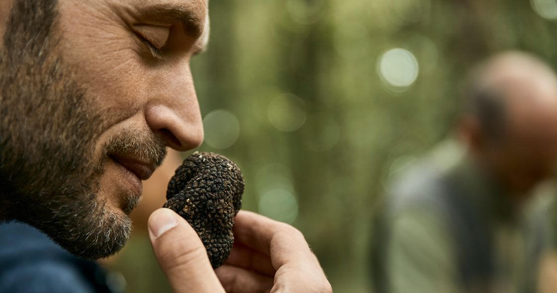 A Man Eating A Chocolate Ice Cream Cone