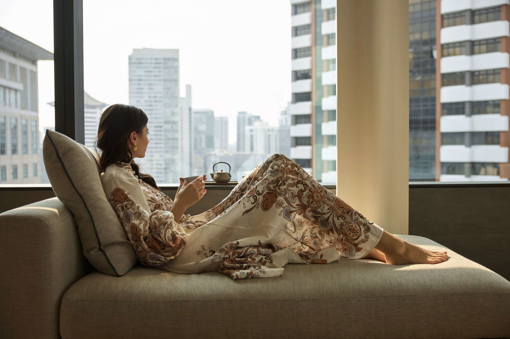 A Person Sitting On A Couch